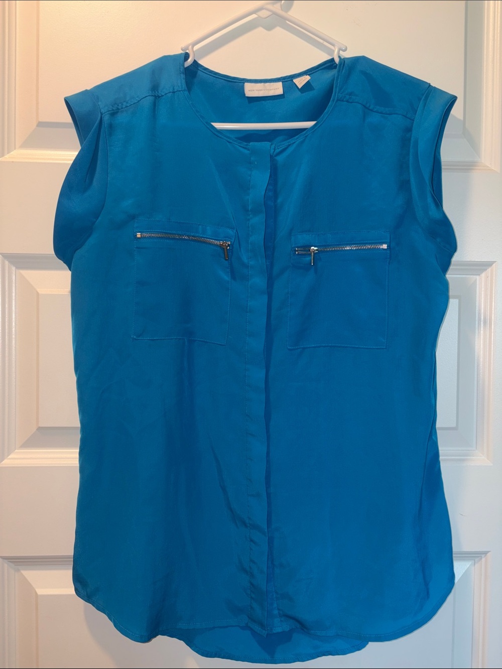 Sleeveless Blue Zip-Pocket Button Down Blouse
